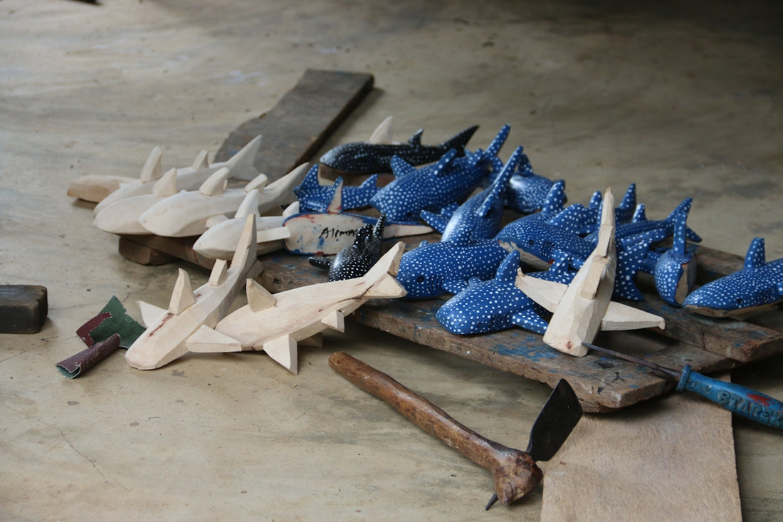 a group of wooden planes sitting on top of a table
